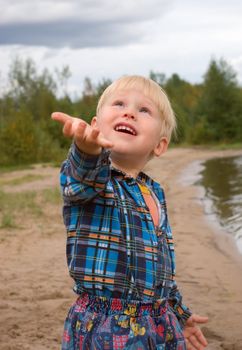 Boy and rain,small boy on nature,year rain