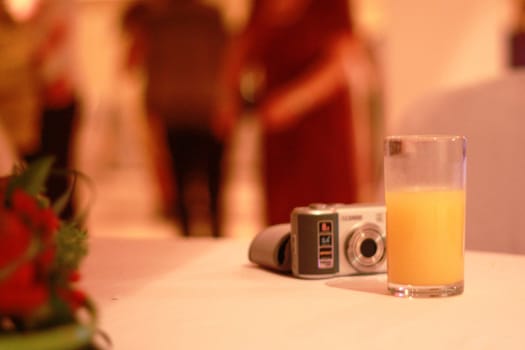 Orange juice (drink) and camera