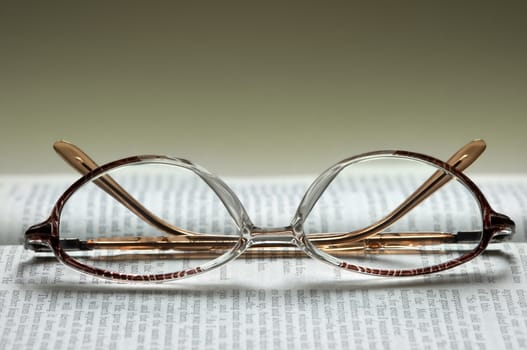 glasses and book