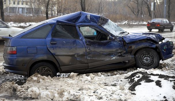 accident on the urban road in the winter time(focus point on the center of the photo)