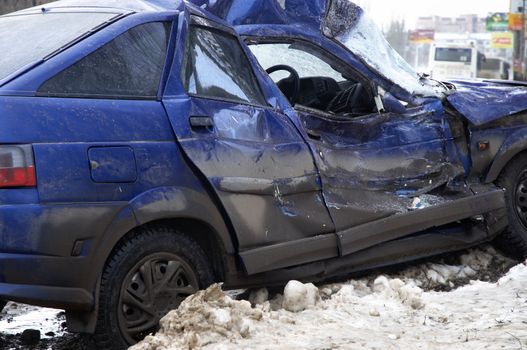 accident on the urban road in the winter time(focus point on the center of the photo)