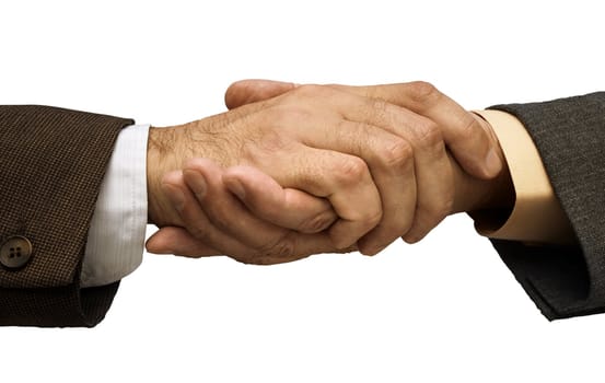 Two businessmen shaking hands ,focus point on the center of the photo
