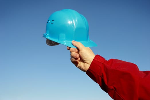 special photo f/x with dark vignetting, focus point on hand with helmet