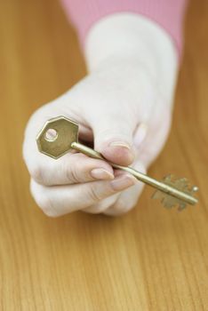 selective focus on key and hand, special soft photo f/x