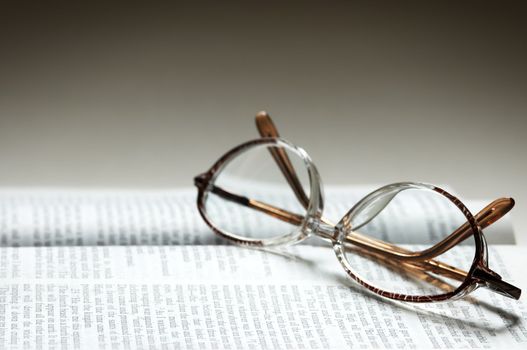 eye-glasses on the text