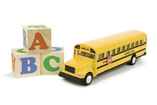 school bus and bricks isolated on white background