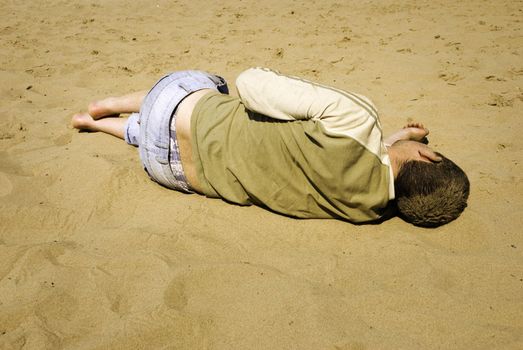 real man blind drunk  on the beach (special toned ,focus point on the head)
