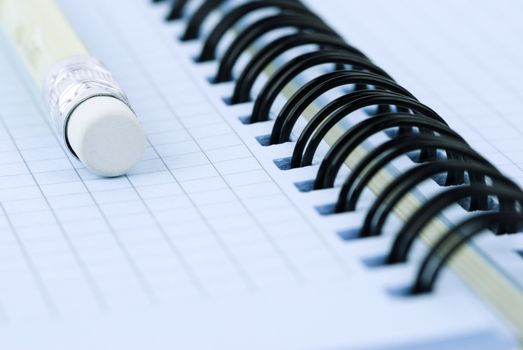 small DOF, focus point on nearest part of pencil with eraser, toned