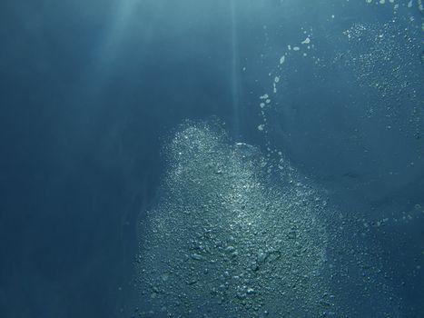 Bubble from scuba diver rising to the surface