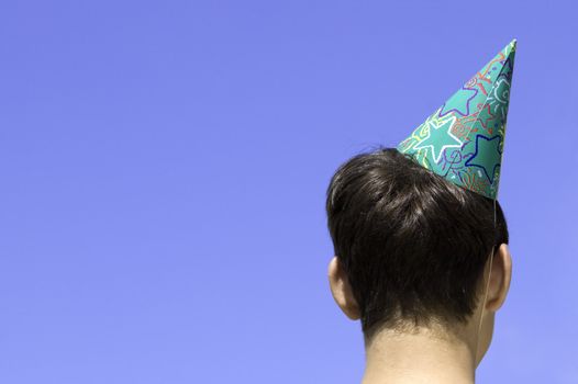 young adult with funny cap 