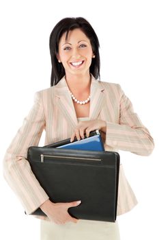 Charming smiling businesswoman holding briefcase with documents and laptop, isolated