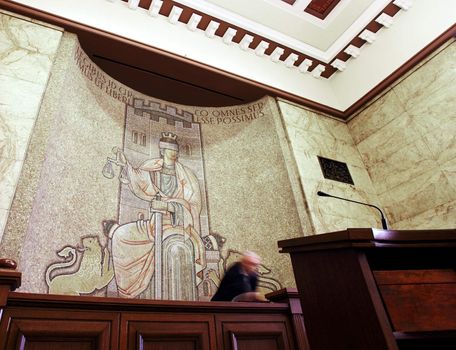 interior of a civil courtroom with mosaic figure of justice