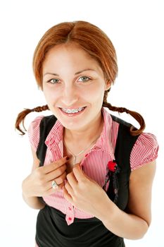 smiling redhead female with braces and brainds looking at camera, isolated