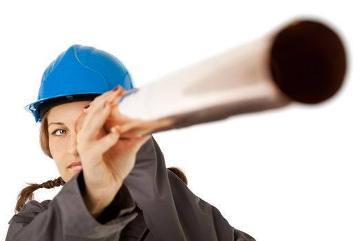 female construction worker with hardhat looking through drainpipe