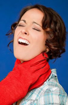 young woman in pain, being strangled by the throat by red glouve