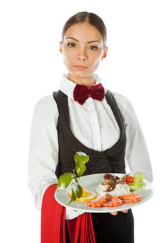 Young waitress standing and holding a dish with seafood salad, isolated on white