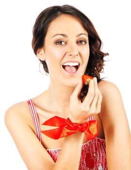 Beautiful female eating cut of strawberry, isolated on white