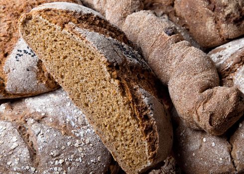 Close-up of fresh loafs of black whole weed bread