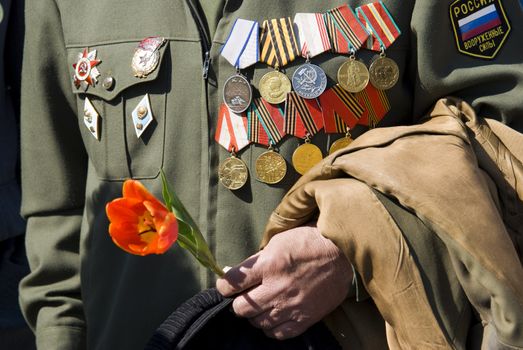 9 may ,Victory Day in Russia (editorial photo, focus point on hand)
