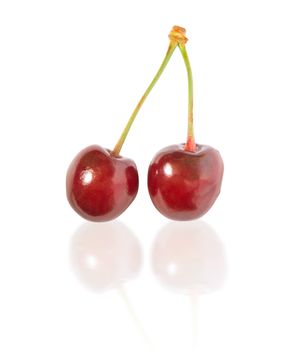 fresh and wet red berry isolated on white background with reflection