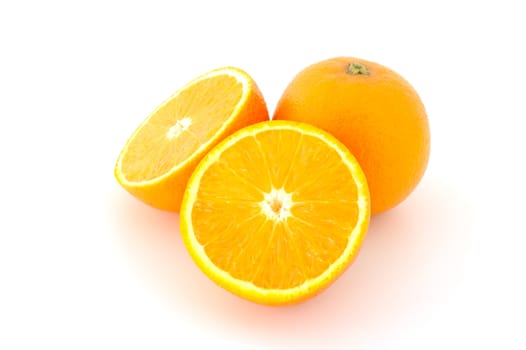Few juicy oranges on verwhite (not isolated) background.