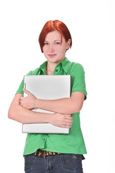 Redheaded girl student hugging her laptop.Shot with Canon 70-200mm f/2.8L IS USM