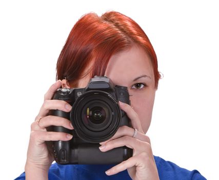 Portrait of a redheaded girl taking photos with a DSRL camera.Shot with Canon 70-200mm f/2.8L IS USM