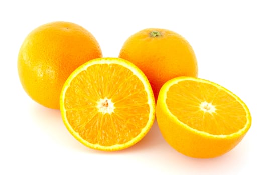 Few juicy oranges on verwhite (not isolated) background.