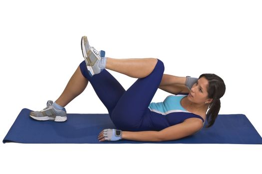 Young active woman doing a fitness exercise 