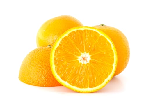 Few juicy oranges on verwhite (not isolated) background.