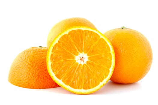 Few juicy oranges on verwhite (not isolated) background.