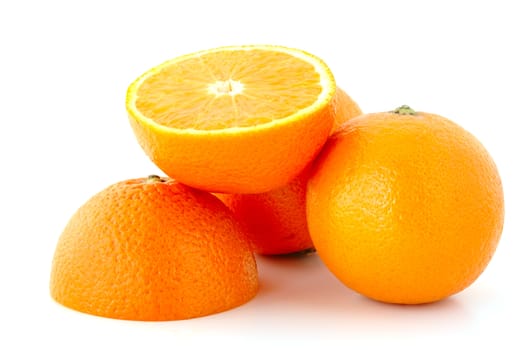 Few juicy oranges on verwhite (not isolated) background.