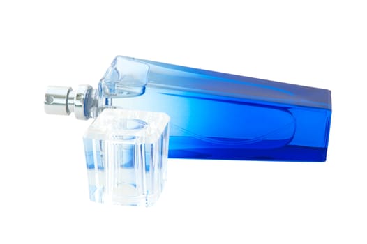 Perfume in deep blue scent-bottle on isolated background.