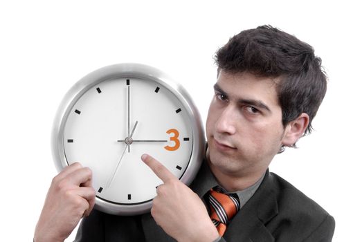 young handsome business man holding a clock