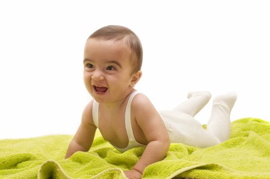 beautiful baby with the green towel on white background



 