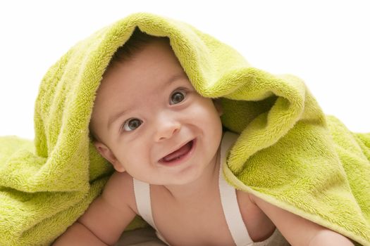 beautiful baby with a towel over your head
