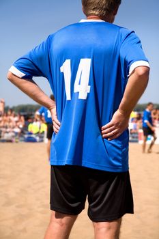 football on the sand, focus point on center of photo