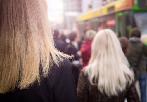 urban citizen concept, focus point on left side( nearest woman)