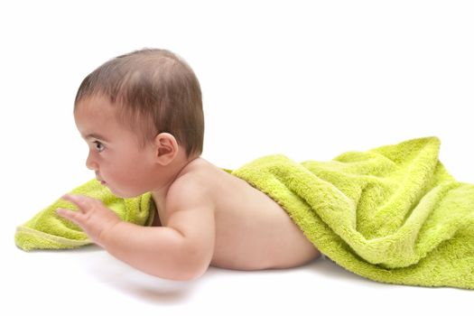 beautiful baby with the green towel on white background



 