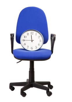 business concept with clock and blue office armchair, focus on center