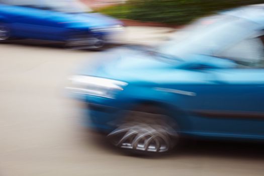 blue cars with blur f/x,speed or transport conncept