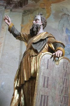 Moses holding the Ten Commandments