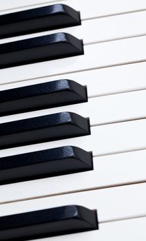 Close up image of the keys of a grand piano