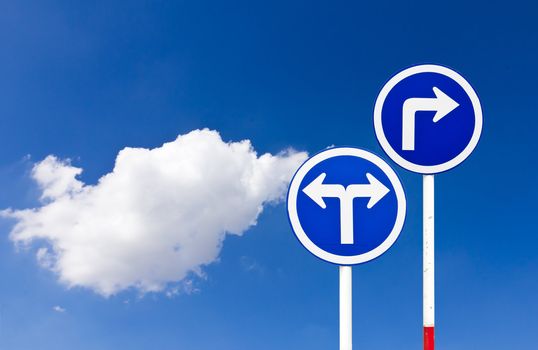 Curved Road Traffic Sign over blue sky,turn right