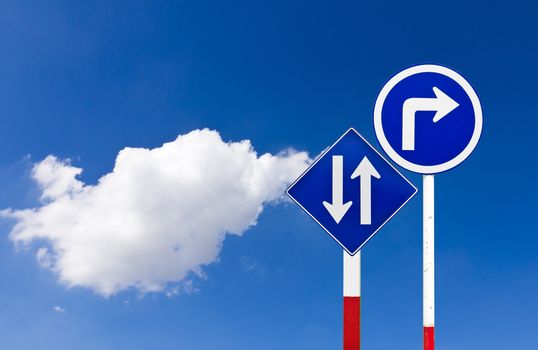 Curved Road Traffic Sign over blue sky,turn right