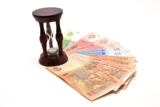 The little sandglass over Ukrainian money