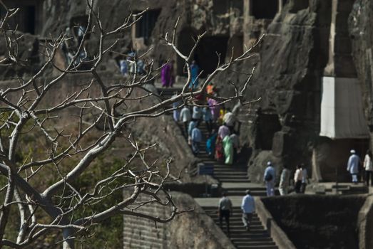 Tourists visiting historical temple in Ajanta, India