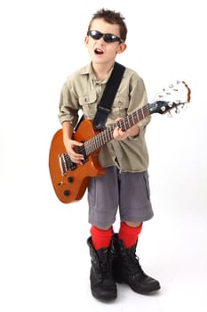 boy playing with a guitar over white