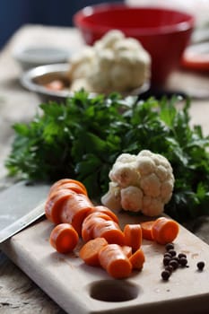 chopped carrot on a wood board,shallow dof 