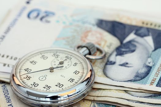 Chronometer and Bulgarian currency close up, shallow dof